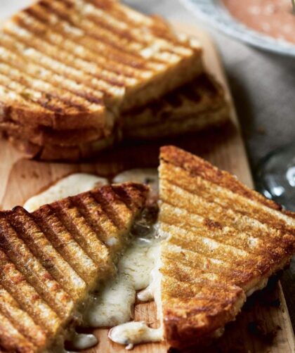 Heat a non-stick skillet over medium heat. Place the sandwiches in the skillet and cover with a lid. Cook for about 3-4 minutes per side, or until the bread is crispy and the cheese is melted.